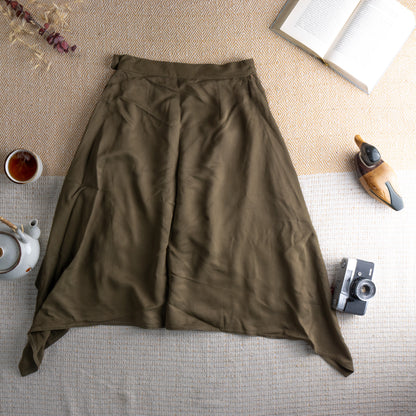 back view Vintage Max Mara 90s Silk Cupro Midi Skirt – olive army green fluid silk-cupro, high waist with single button closure, dramatic deep side slits revealing blush lining, asymmetric draped hem, minimalist Italian luxury, flat lay editorial shot