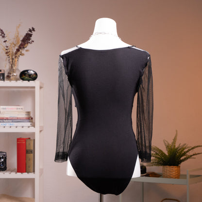 back view Archival La Perla Tricot 90s Long Sleeve Mesh Bodysuit – sheer black mesh with dramatic 3D chenille rose appliqué across chest and torso creating tattoo effect, round neckline with satin trim, long sleeves, black opaque high-cut brief base, Italian museum grade lingerie, product shot on dress form