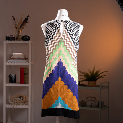 Archival Missoni Angela Missoni Era Y2K Chevron Knit Mini Dress – bold colour block optical illusion knit with black and white zigzag chevron at shoulders transitioning into concentric arch panels in mint green, cream, cobalt blue, amber orange and turquoise, sleeveless, keyhole back, straight shift silhouette, Made in Italy, product shot on dress form