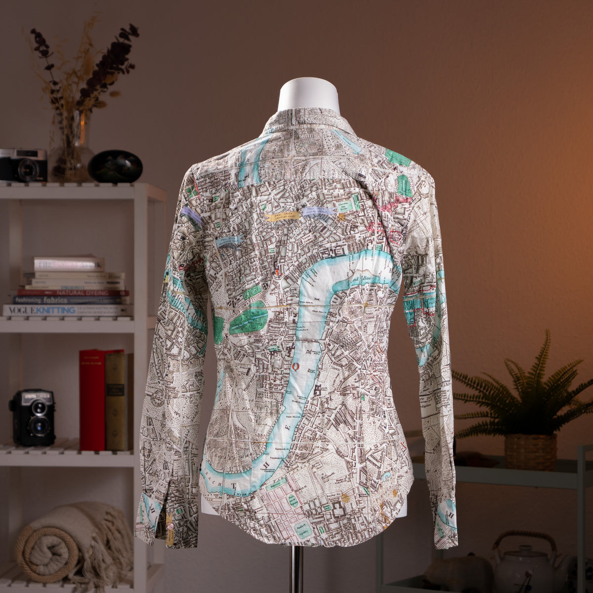 Archival Paul Smith Black Label NOS London Cartography Map Print Blouse – cream Italian cotton with all-over vintage London street map print in teal, blue, red and black, point collar, button-front, long sleeves with button cuffs, fitted silhouette, product shot on dress form