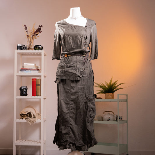 Archive Cop Copine "Pontivy" 90s French Avant-Garde Utility Gown – gunmetal grey cotton taffeta maxi dress with asymmetric square neckline, three-quarter sleeves with button detail, trompe l'oeil layered cargo pocket skirt with drawstring ruching, original amber resin belt, ruffled hem, product shot on dress form