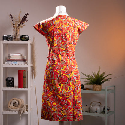 back view Pierre Balmain Paris 1970s NOS Deadstock Cotton Dress – bold abstract floral print in red, yellow, grey and black on 100% cotton, deep V-neckline with gathered detail, cap sleeves, A-line midi silhouette, French luxury curator find, product shot on dress form