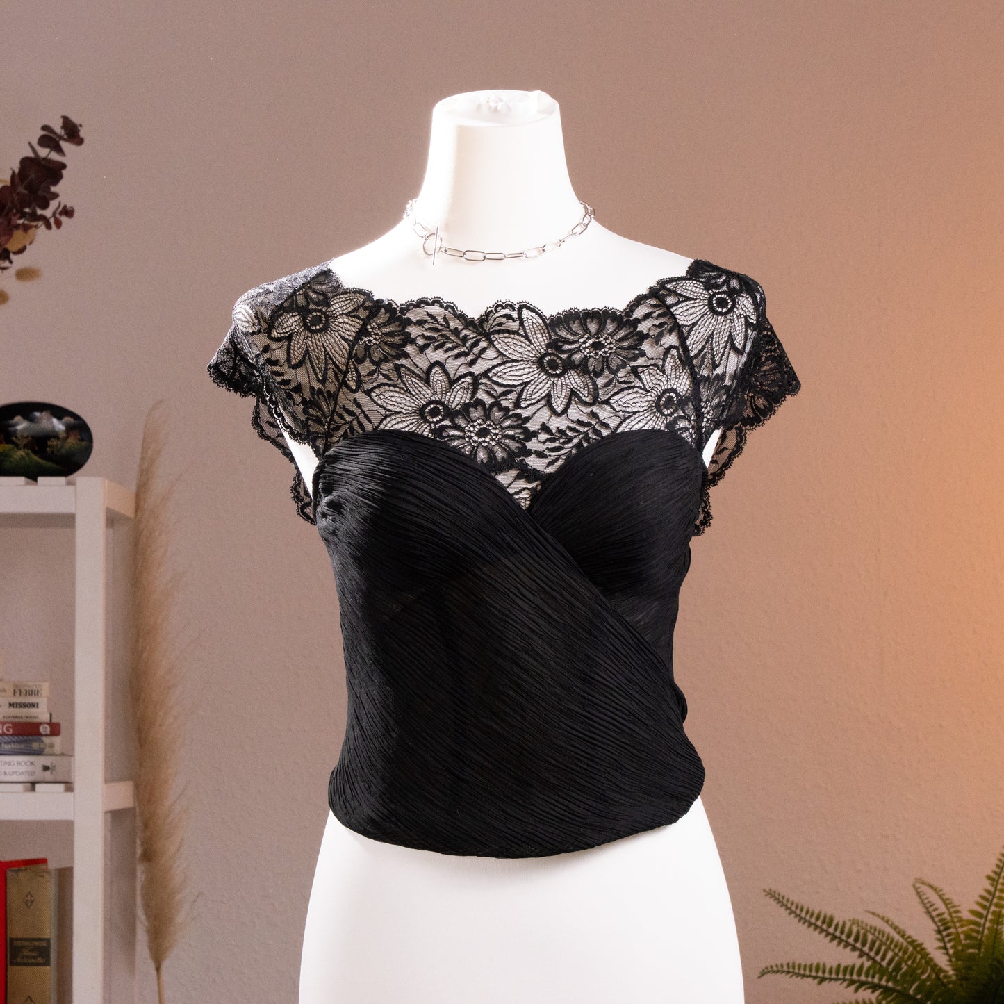 Archival La Perla 90s NOS Plissé Sculpt Bustier Corset Top – black pleated satin with crossover draped sweetheart bodice, sheer floral Leavers lace illusion neckline and cap sleeves with scalloped trim, boned corset structure, museum quality Italian lingerie, product shot on dress form
