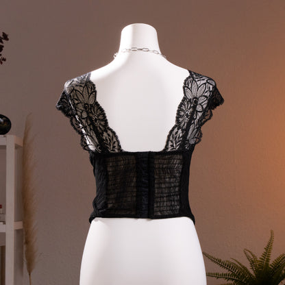 back view Archival La Perla 90s NOS Plissé Sculpt Bustier Corset Top – black pleated satin with crossover draped sweetheart bodice, sheer floral Leavers lace illusion neckline and cap sleeves with scalloped trim, boned corset structure, museum quality Italian lingerie, product shot on dress form