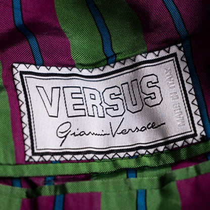 Immaculate view of the archival Versus Gianni Versace black and white woven inner label with vertical Made in Italy text.
