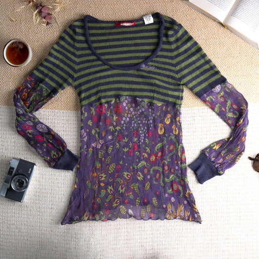 Miss Sixty Archival Y2K Silk Mohair Blend Mixed Media Top – navy and olive green horizontal stripe mohair knit upper body with scoop neckline and Miss Sixty red logo label, purple crinkle silk chiffon lower body and long sleeves with all-over botanical floral print in red, yellow and green, lettuce edge hem, whimsigoth fairycore grunge, flat lay editorial shot