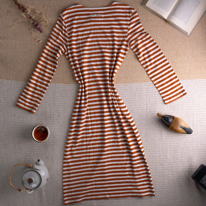 back view Jean Paul Gaultier JPG Jean's Archival 90s Marinière Stripe Midi Dress – rust orange and white horizontal stripe stretch jersey, optical illusion trompe l'oeil ruched bust effect, single chest patch pocket, scoop neckline, long sleeves, body-con midi silhouette, JPG Jean's Collection 0007 woven label, flat lay editorial shot