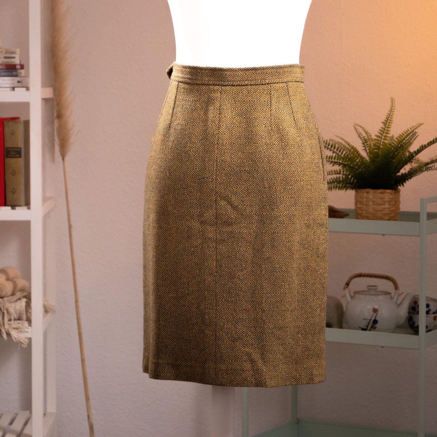 back view Archival Yves Saint Laurent Rive Gauche 70s Geometric Diamond Jacquard Wool Skirt – olive gold wool with all-over woven diamond lattice jacquard pattern, high waist with structured waistband, front pleat, straight pencil silhouette, knee length, museum quality YSL vintage, product shot on dress form