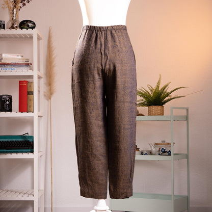 back view Archival Pierre Balmain Boutique 90s Linen Trousers – dark brown melange linen with subtle flecked texture, elasticated high waist, relaxed tapered leg, side pockets, cropped ankle length, product shot on dress form