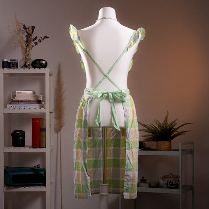 back view Archival Courrèges Paris 80s Japan License Metallic Lurex Gingham Pinafore Dress – oversized pastel check in mint green, butter yellow and white with metallic lurex shimmer, ruffled flutter shoulder straps, square neckline, open-back tabard silhouette with tie waist, two front patch pockets, midi length, rare Japan license piece, product shot on dress form