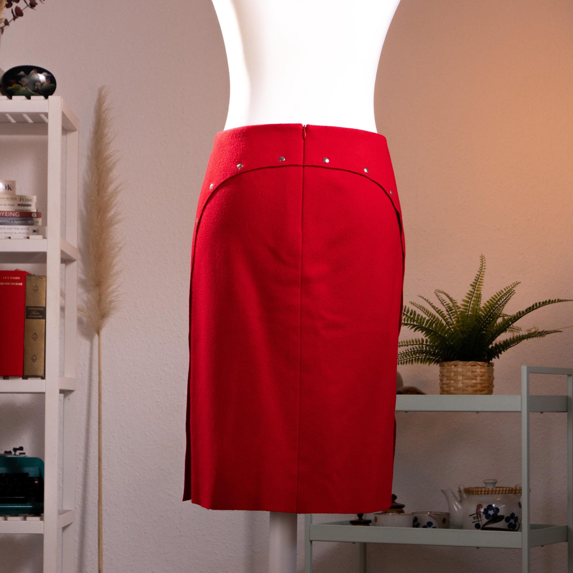 back view Archival Jil Sander Mainline 90s Red Wool Cashmere Pencil Skirt – lipstick red fine wool-cashmere blend, high waist with curved saddle yoke seaming, five silver snap buttons down the side slit, straight midi pencil silhouette, minimalist German precision tailoring, Made in Germany, product shot on dress form