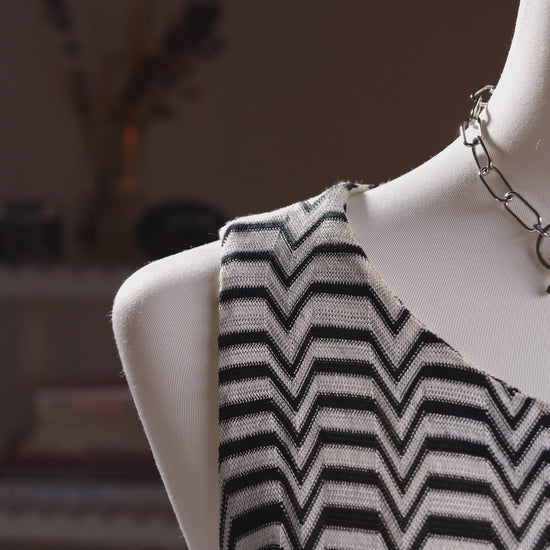 Archival Missoni Angela Missoni Era Y2K Chevron Knit Mini Dress – bold colour block optical illusion knit with black and white zigzag chevron at shoulders transitioning into concentric arch panels in mint green, cream, cobalt blue, amber orange and turquoise, sleeveless, keyhole back, straight shift silhouette, Made in Italy, product shot on dress form