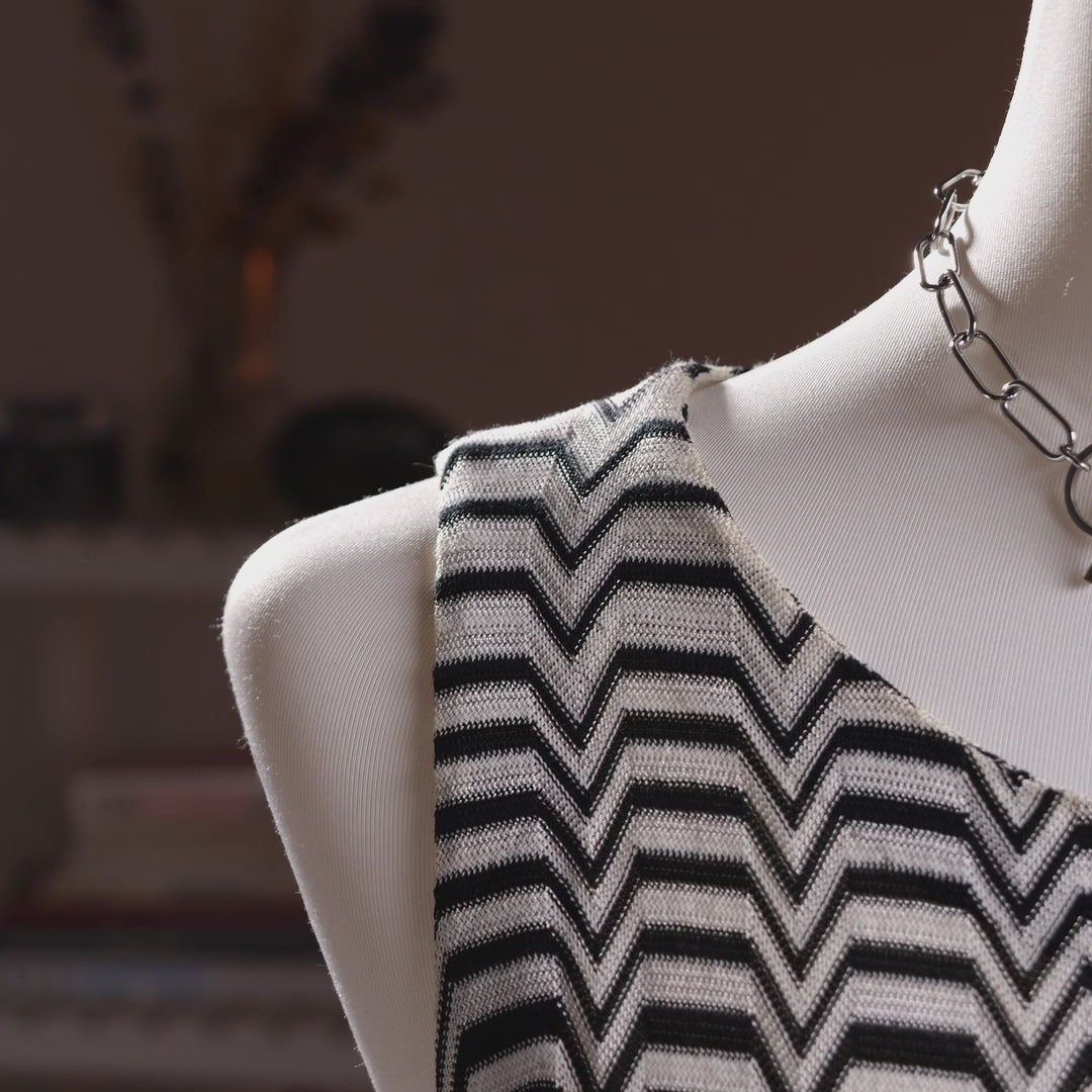 Archival Missoni Angela Missoni Era Y2K Chevron Knit Mini Dress – bold colour block optical illusion knit with black and white zigzag chevron at shoulders transitioning into concentric arch panels in mint green, cream, cobalt blue, amber orange and turquoise, sleeveless, keyhole back, straight shift silhouette, Made in Italy, product shot on dress form