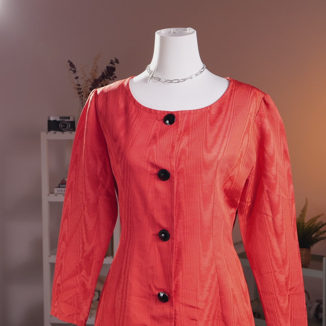 Archival Givenchy Boutique 1980s Red Taffeta Moiré Power Dress – vibrant red moiré taffeta structured bodice with scoop neckline, long sleeves with puff shoulder detail, vertical seam panelling for fitted silhouette, large black cabochon jewel buttons, contrasting black pencil skirt, dynasty glamour aesthetic, product shot on dress form